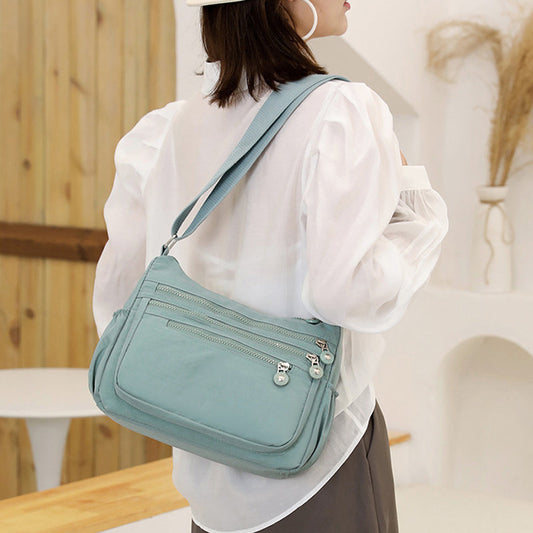 Lehká nylonová crossbody taška s více kapsami
