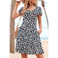Kobieca sukienka w kwiaty, fason A-line z kieszeniami